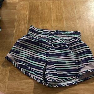 Navy blue teal/mint green, purple and pink athletic shorts